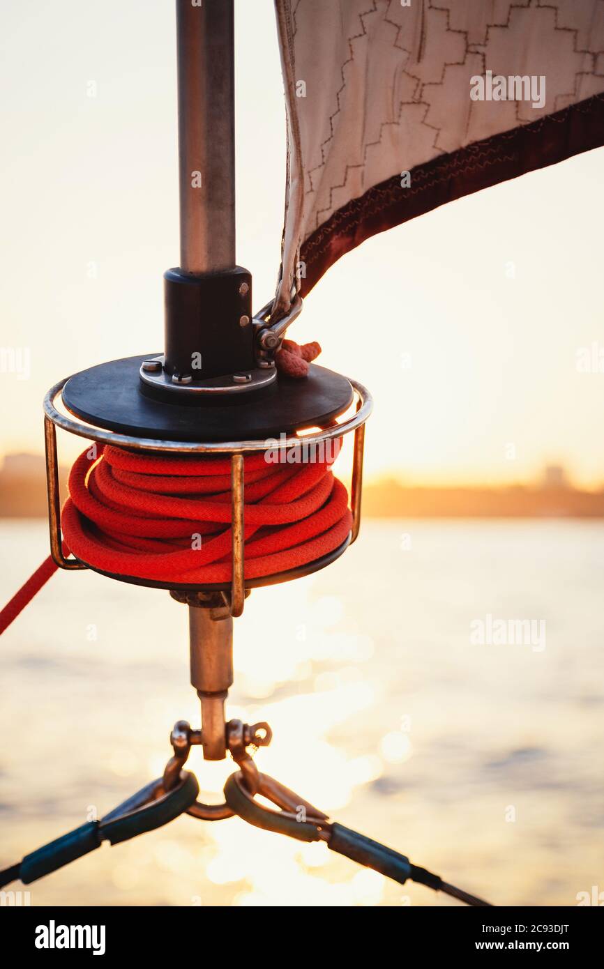 Sailboat winch, sail and nautical rope yacht detail. Yachting, marine background Stock Photo