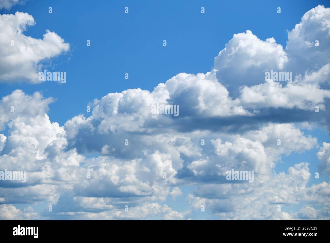 Many white clouds in the blue sky Stock Photo - Alamy
