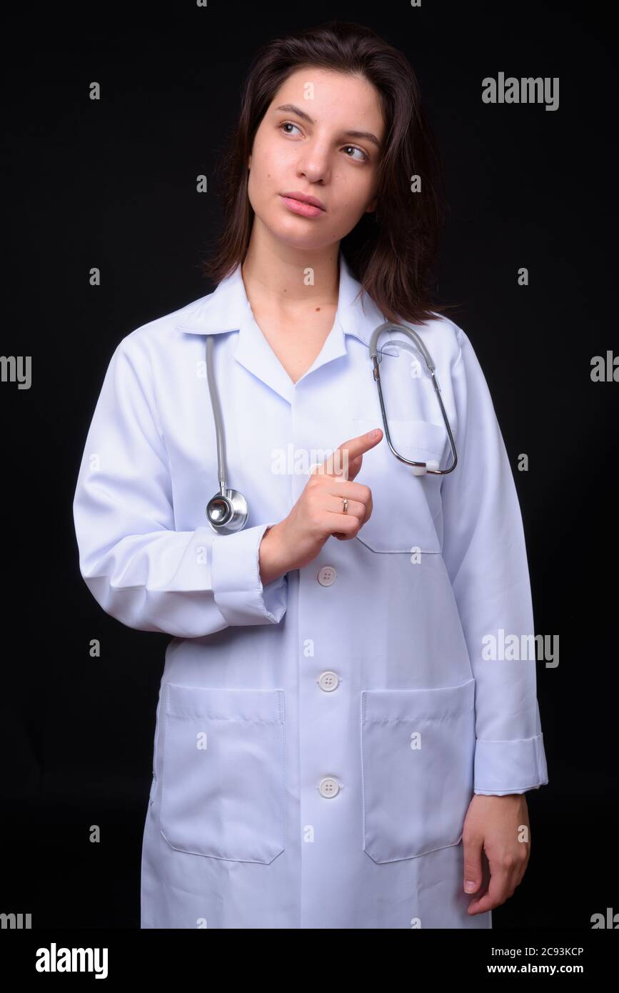 Portrait of young beautiful woman doctor with short hair Stock Photo ...