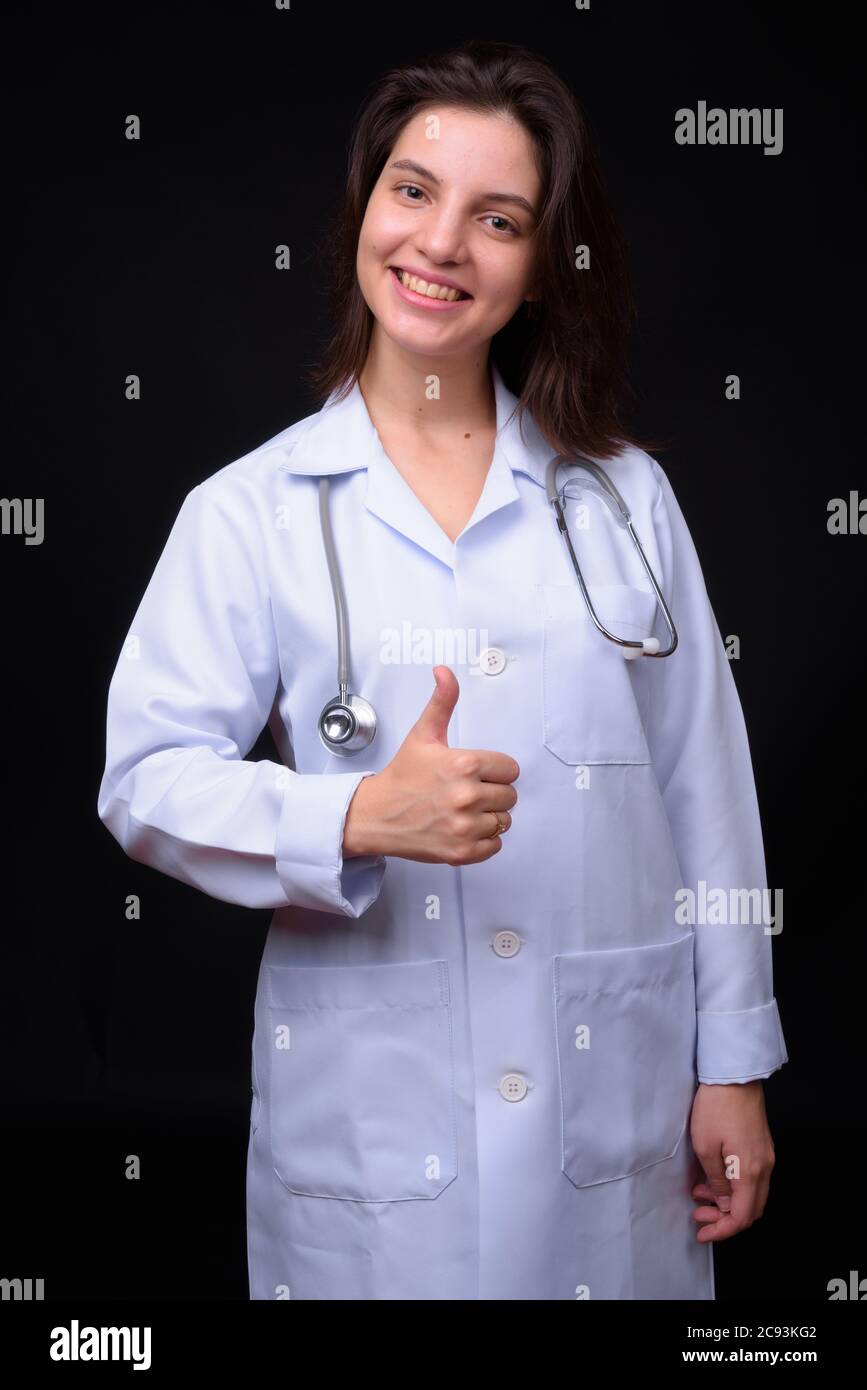 Portrait of young beautiful woman doctor with short hair Stock Photo ...