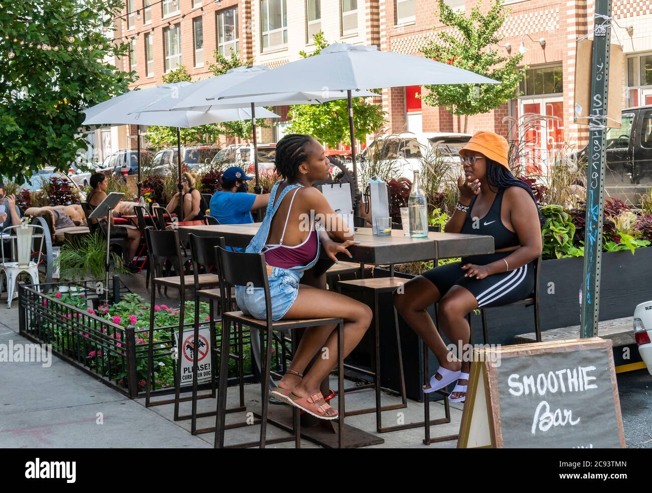 Outdoor seating at a restaurant in the Williamsburg neighborhood of  Brooklyn in New York on Saturday, July 25, 2020. (© Richard B. Levine Stock  Photo - Alamy