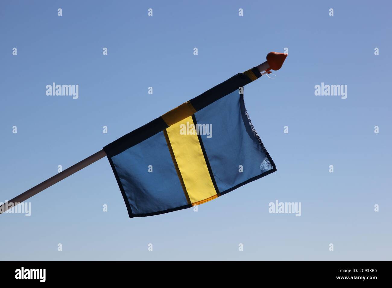 Swedish flag rolled up Stock Photo