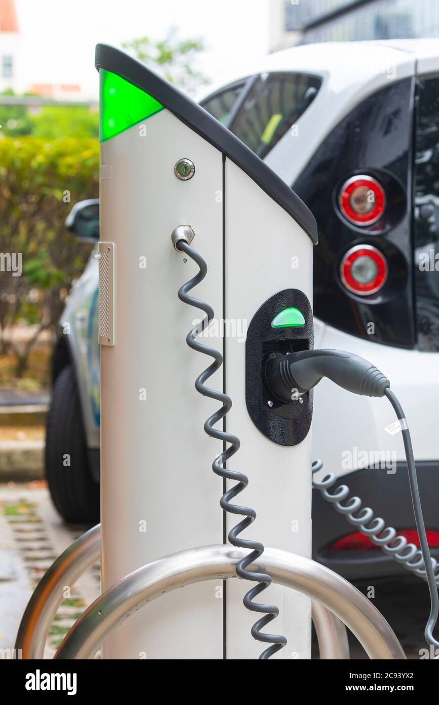Electric car charging station at street level in Singapore, Southeast Asia Stock Photo Alamy