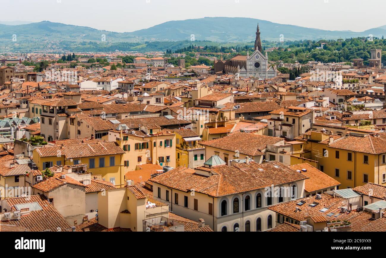 View of Florentine Rooftops & Skyline with Santa Croce Church in Florence, Italy Stock Photo