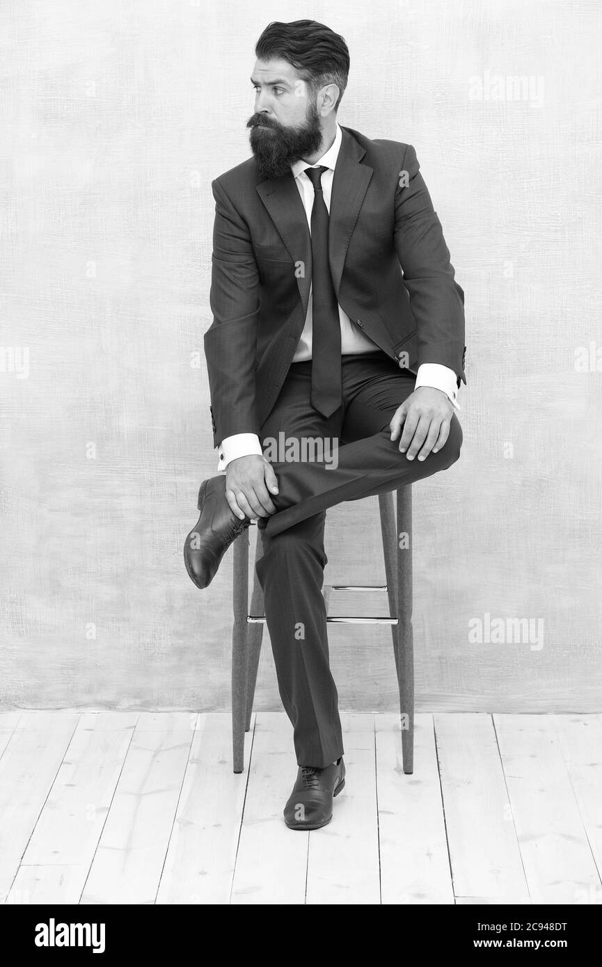 Classy and formal. Bearded man wear formal suit. Elegant lawyer sit on chair. Dressing up for business meeting. Formal event. Formal fashion style. Dress code. Office attire Stock Photo Alamy