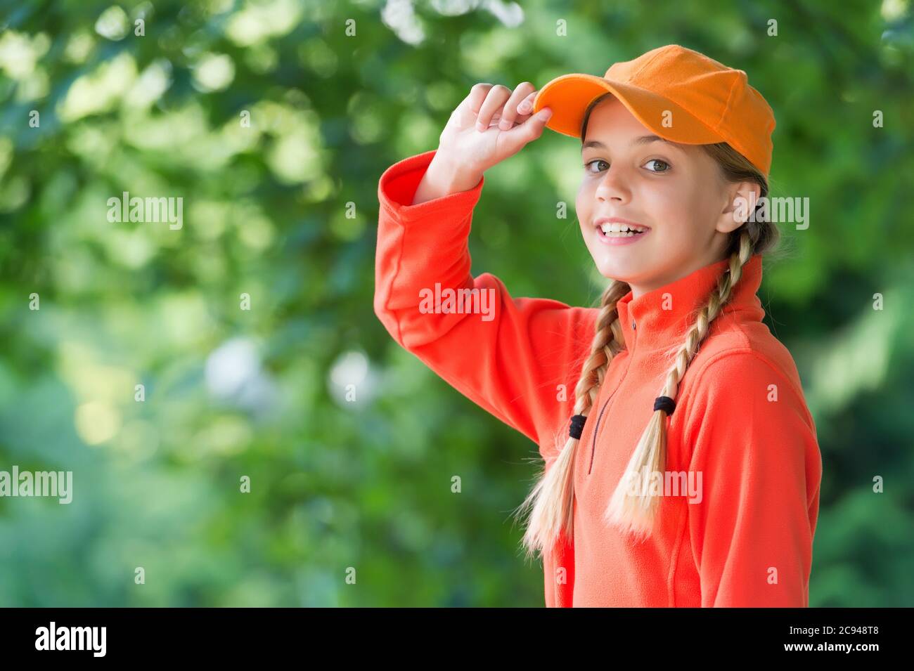 https://c8.alamy.com/comp/2C948T8/her-style-is-a-lot-more-casual-happy-child-in-casual-style-natural-outdoors-little-girl-wear-baseball-cap-casual-wardrobe-childrens-clothing-summer-fashion-trendy-everyday-clothes-copy-space-2C948T8.jpg