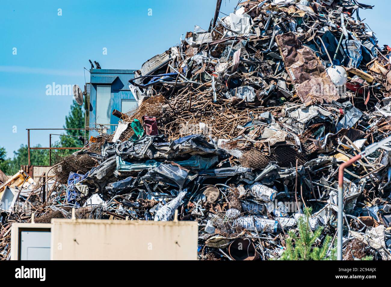 Heap scrap, metal rubbish warehouse in a recycling company. Base of
