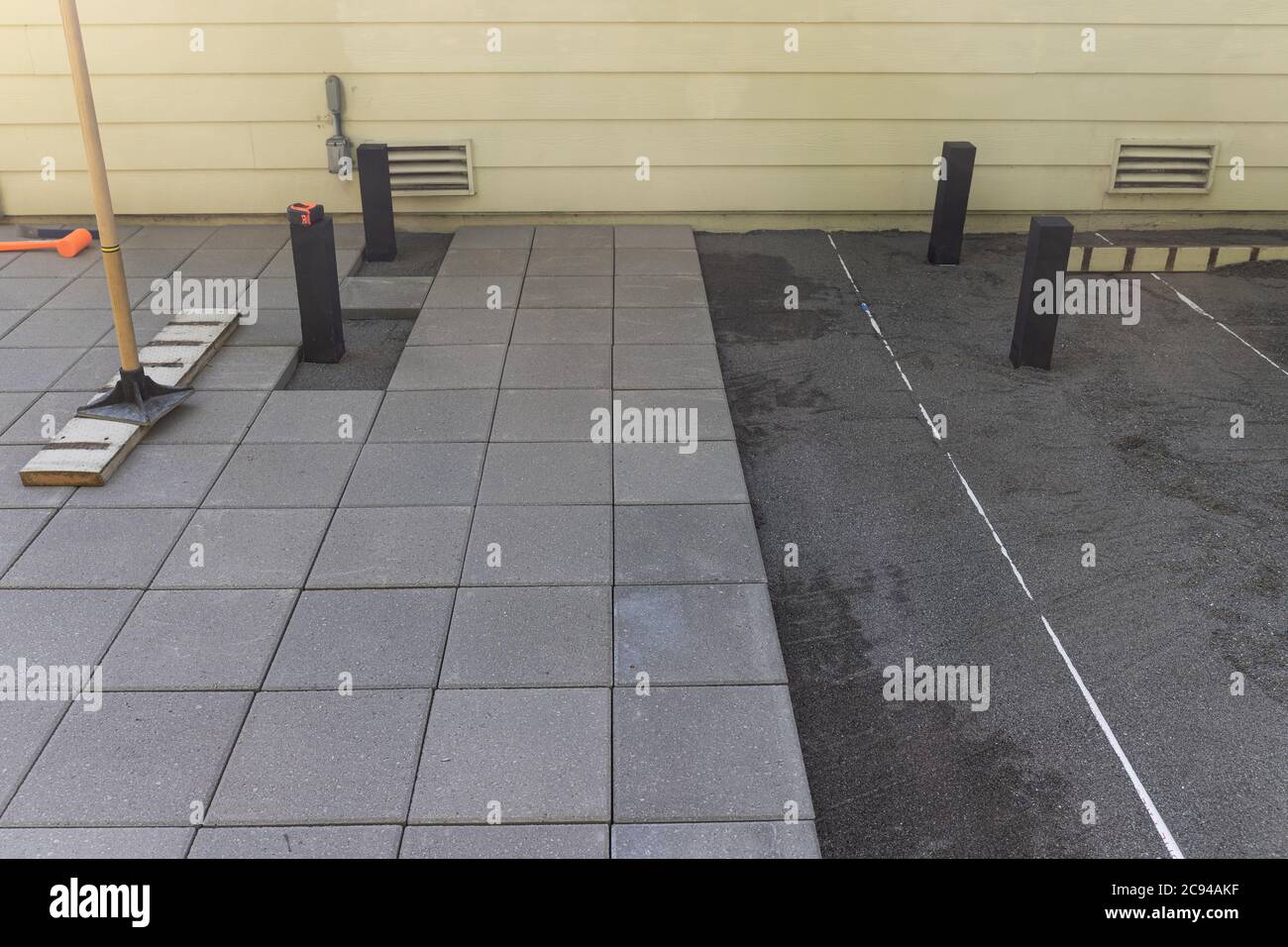 Installation of Paver Patio at Residential Home Stock Photo - Alamy