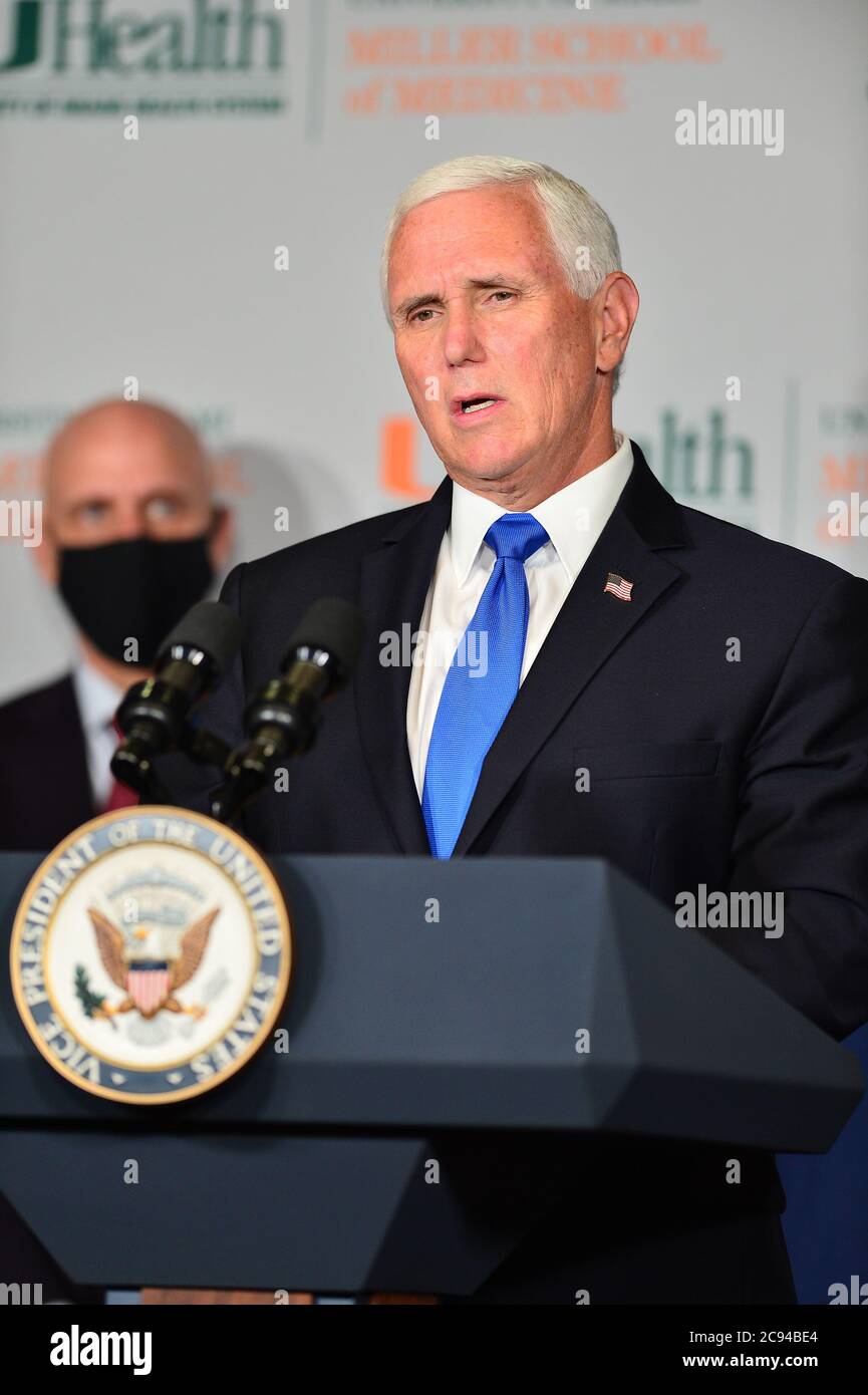 Miami, Florida, USA. 27th July, 2020. U.S. Vice President Mike Pence speaks during a press conference to mark the beginning of Phase III trials for a Coronavirus vaccine at the University of Miami Miller School of Medicine, Don Soffer Clinical Research Center on July 27, 2020 in Miami, Florida. The Vice President participate in a roundtable with Florida Gov. Ron DeSantis, FDA Commissioner, university leadership and researchers on the progress of a Coronavirus vaccine. Credit: Mpi10/Media Punch/Alamy Live News Stock Photo