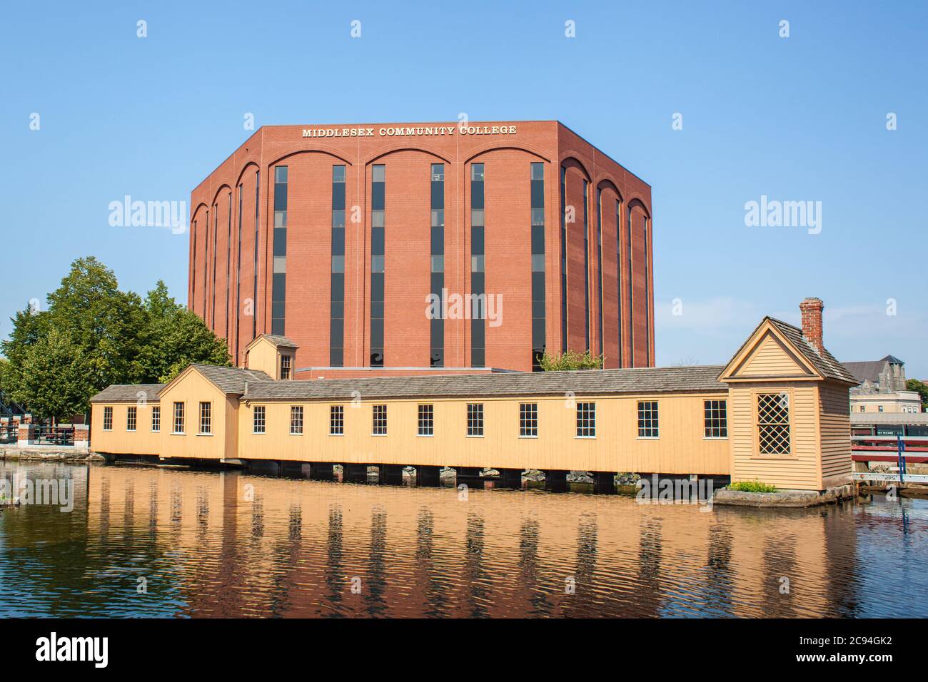 Middlesex Community College sits on the eastern Canal on the left and the Concord River on the right Stock Photo