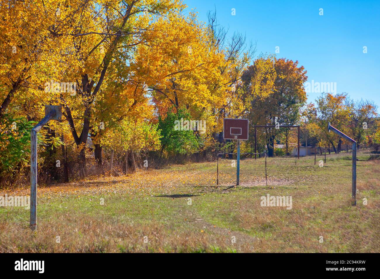 Autumn scenery with abandoned basketball court . Abandoned sports field ...
