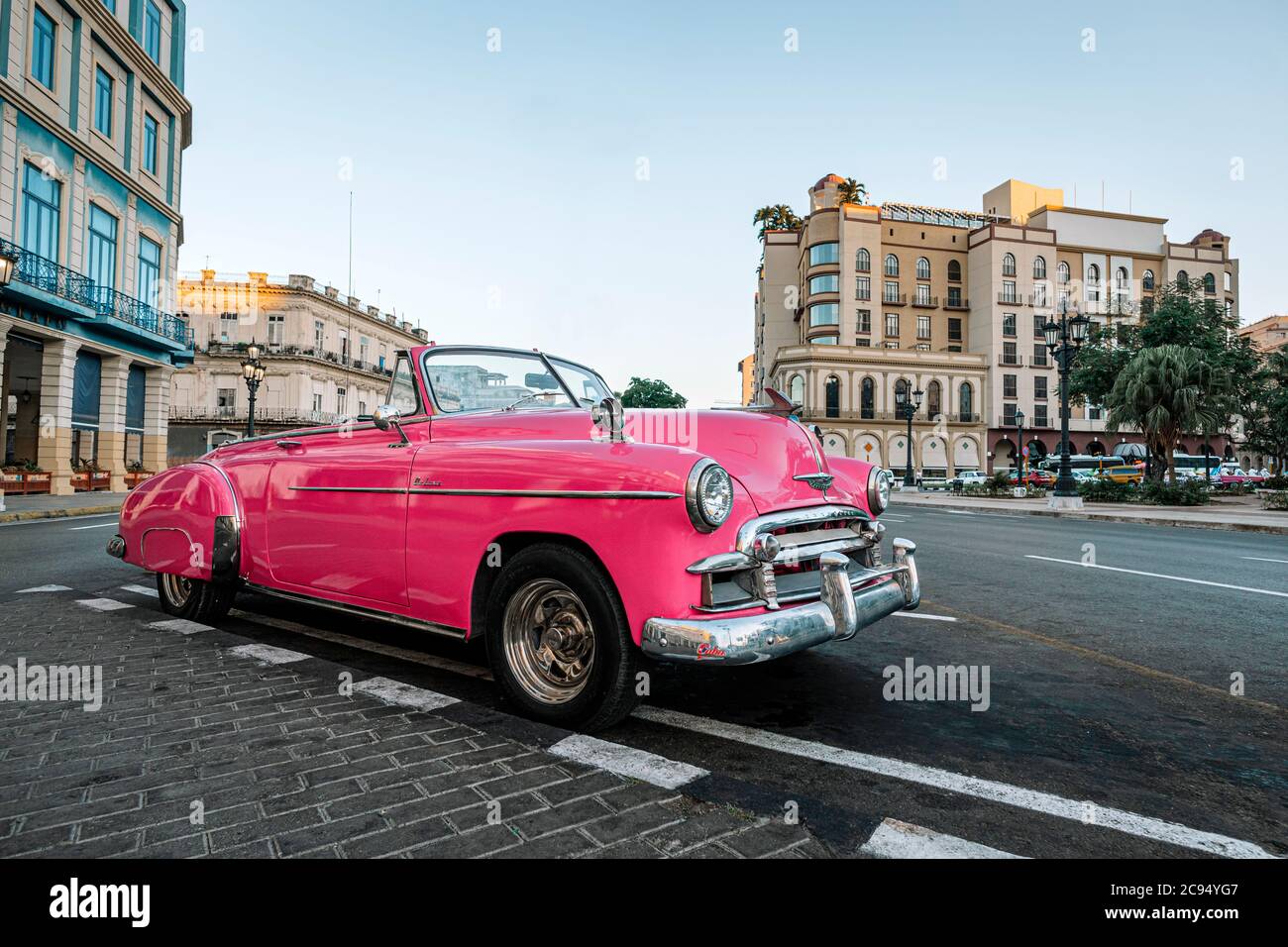 Old American car on streets of capital city of Cuba. Famous tourist attraction, cars from 50s and 60s. Stock Photo