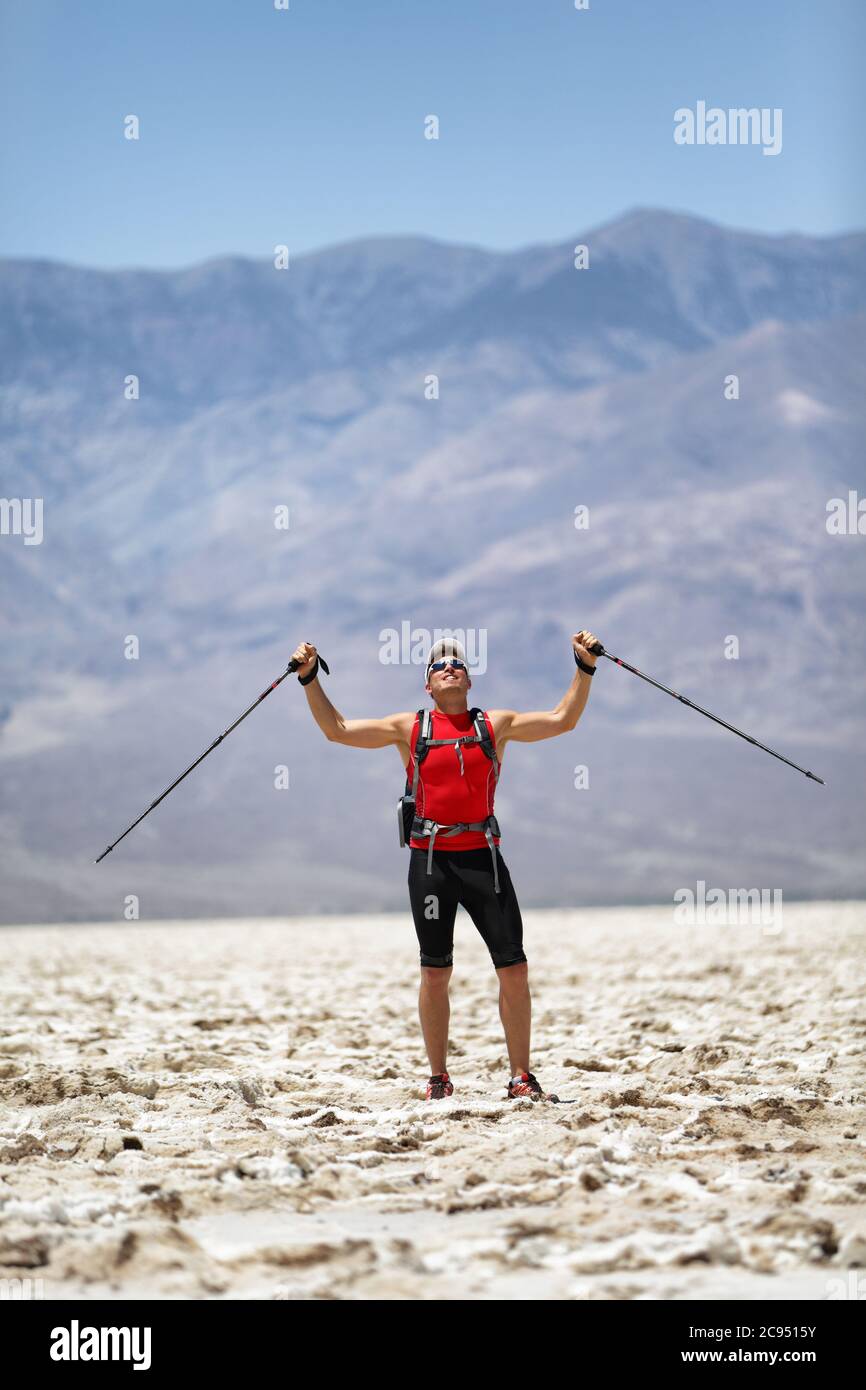 Man runner trekking poles hi-res stock photography and images - Alamy