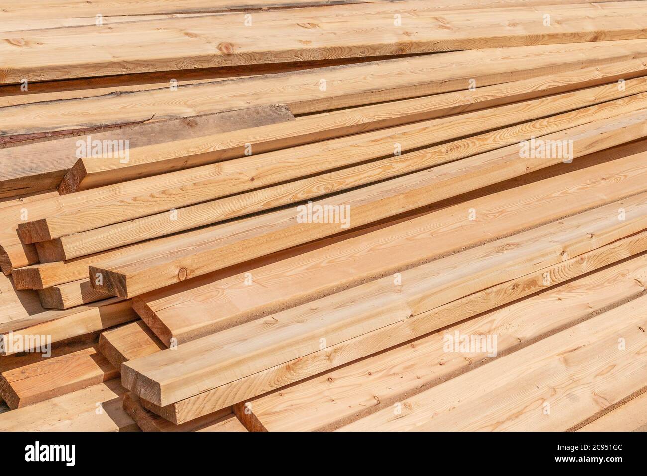 Stack of fresh construction boards or bars Stock Photo