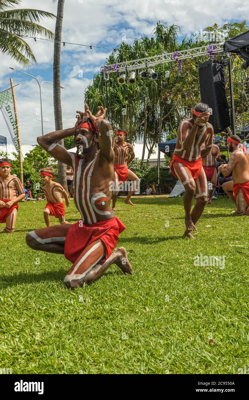 Traditional aboriginal dancers from Yarrabah in Queensland, Australia perform for tourists at the Indigenous art and culture festival in Cairns. Stock Photo