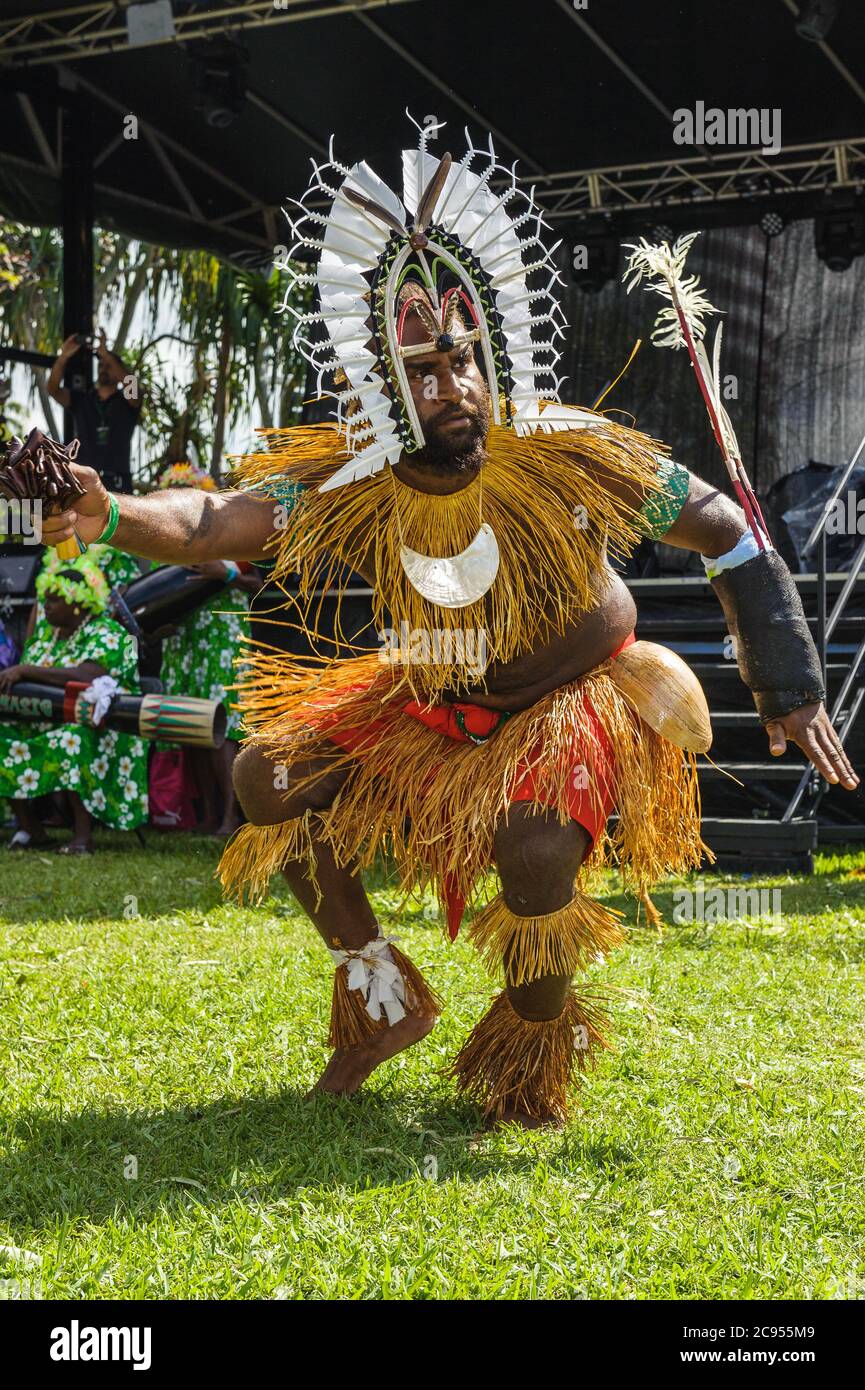Torres Strait Island dancers in spectaular costumes and iconic headress perform at the Indigenous Art and Culture festival in Cairns, Queensland. Stock Photo