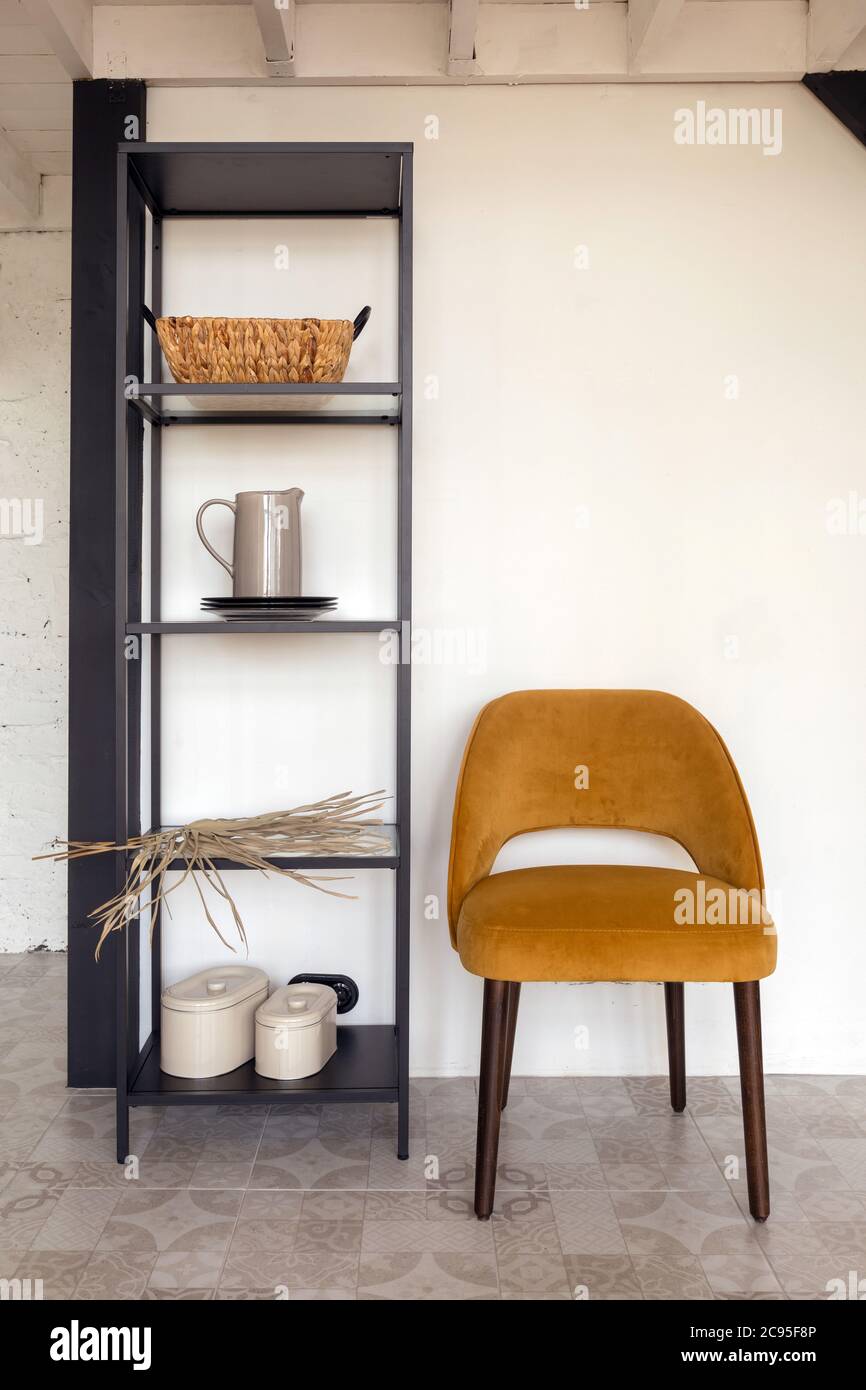 Chair and shelves with decorations Stock Photo Alamy