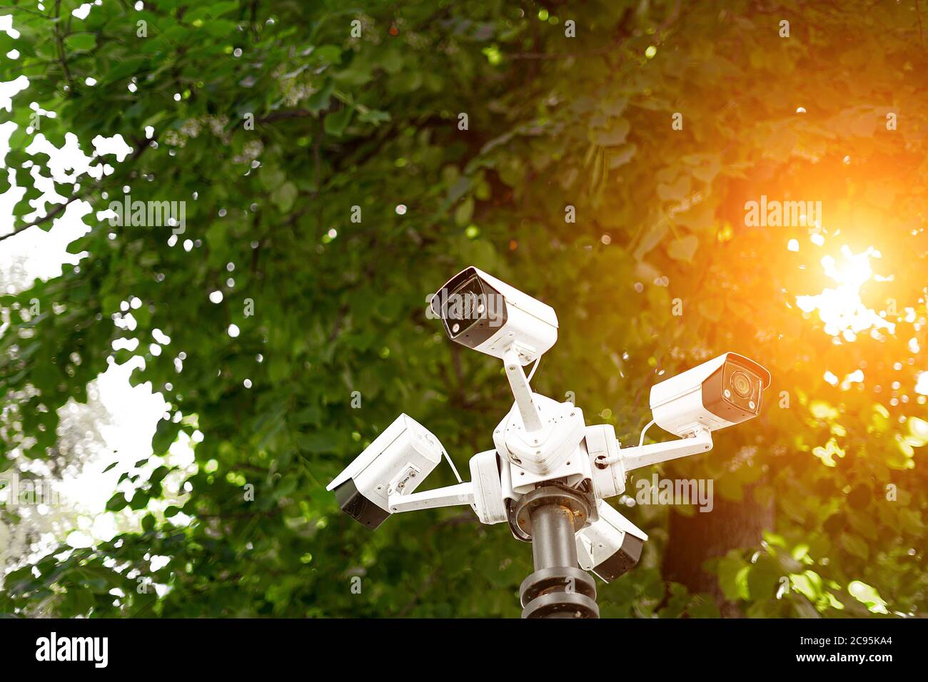 video surveillance system on a pole in the park close-up Stock Photo
