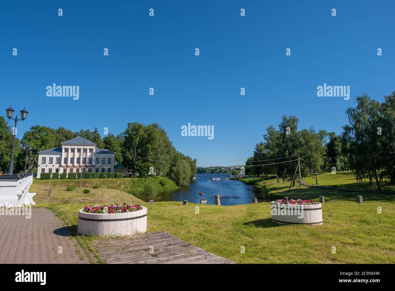 View of the Uglich Museum and Kamenny Brook flowing into the Volga River on a sunny summer day. Stock Photo