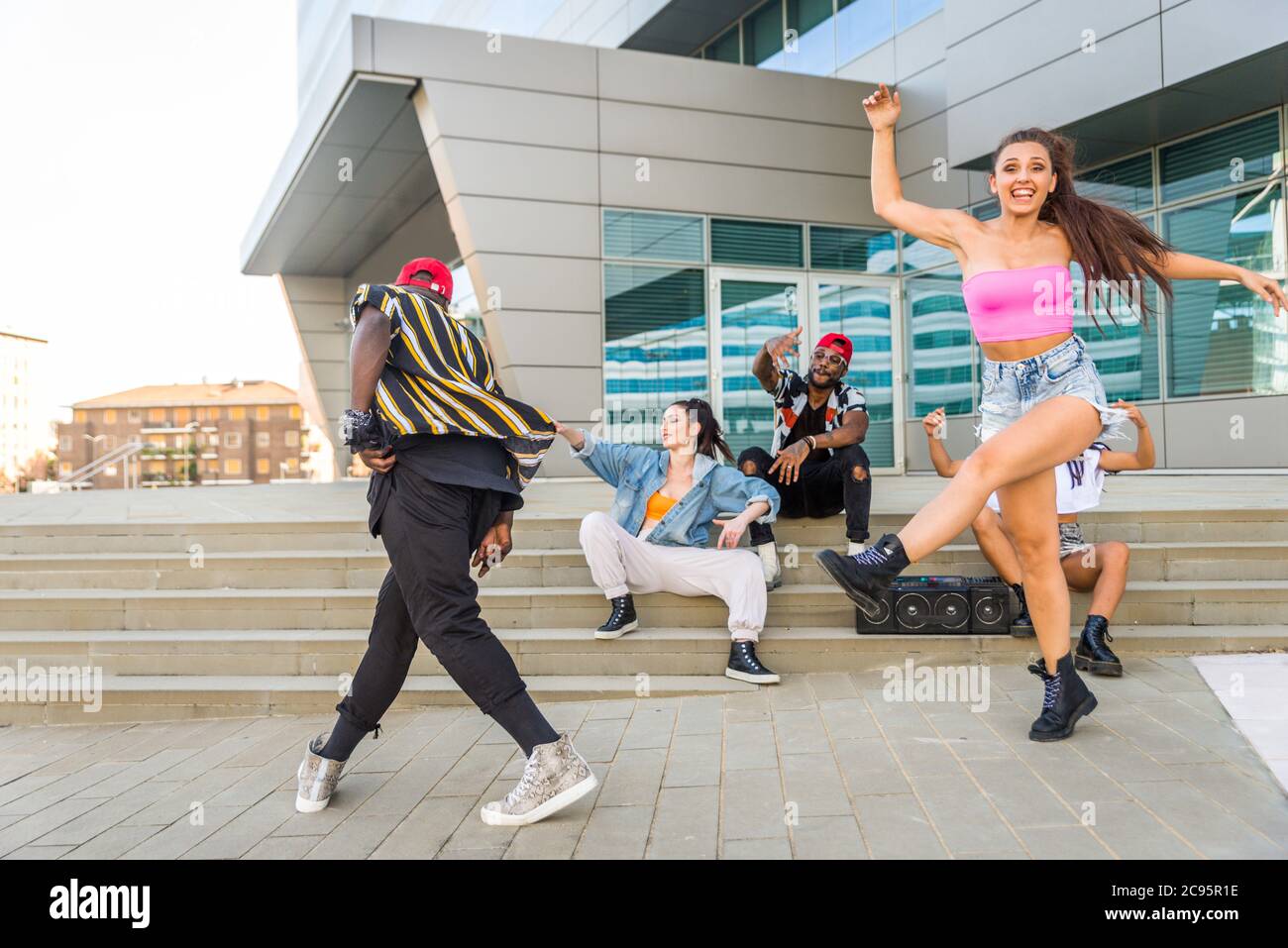 Hip hop crew dancing - Multiracial group of people having fun outdoors ...