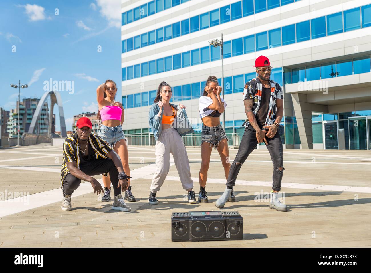 Hip hop crew dancing - Multiracial group of people having fun outdoors ...