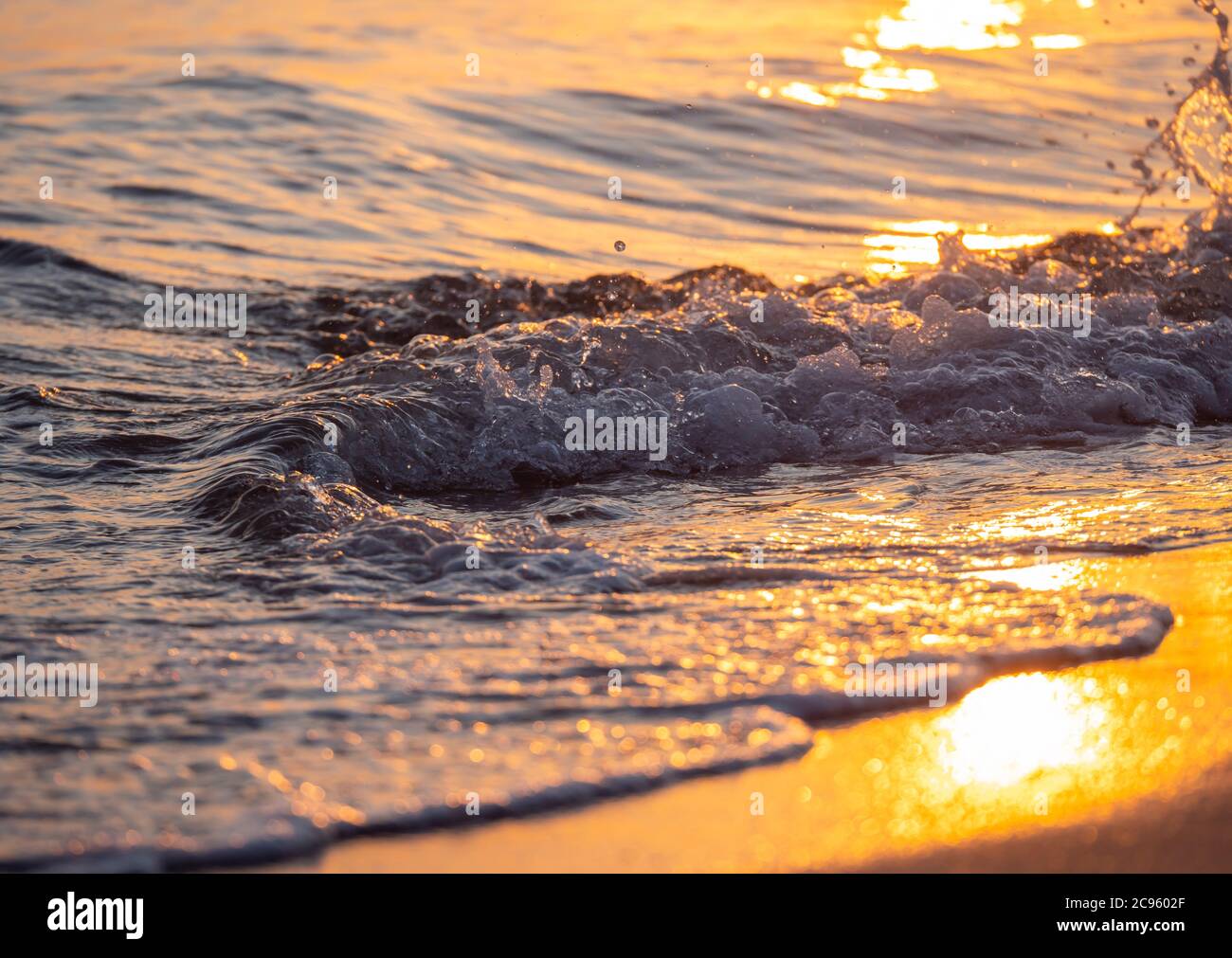 wave splash sea beach macro, close up Stock Photo - Alamy