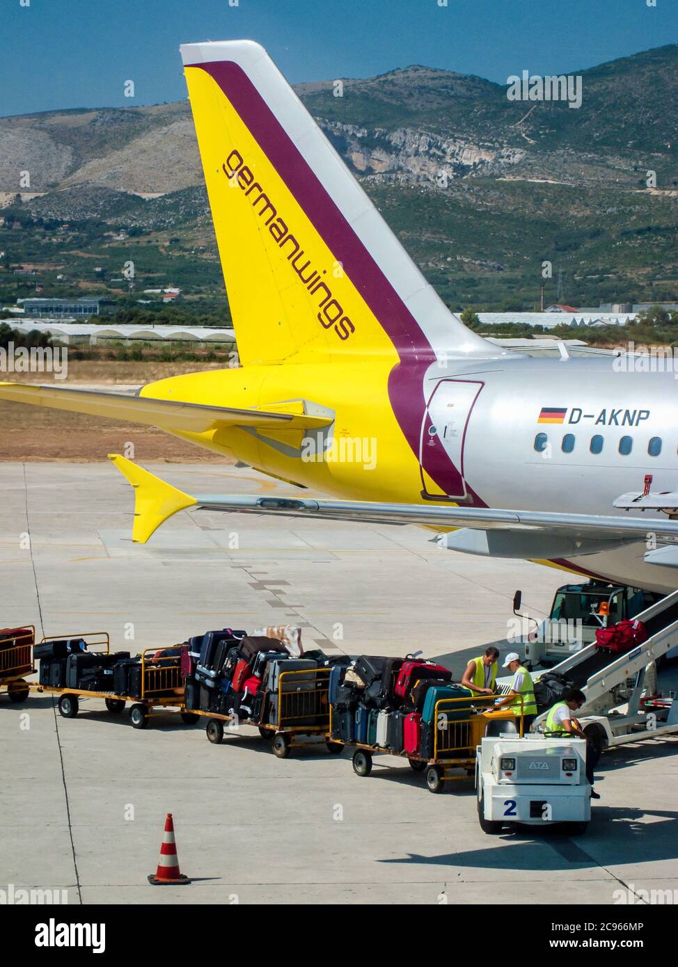Split, Dalmatia, Croatia - At Split airport, luggage is loaded onto an aircraft of the German airline germanwings. Stock Photo
