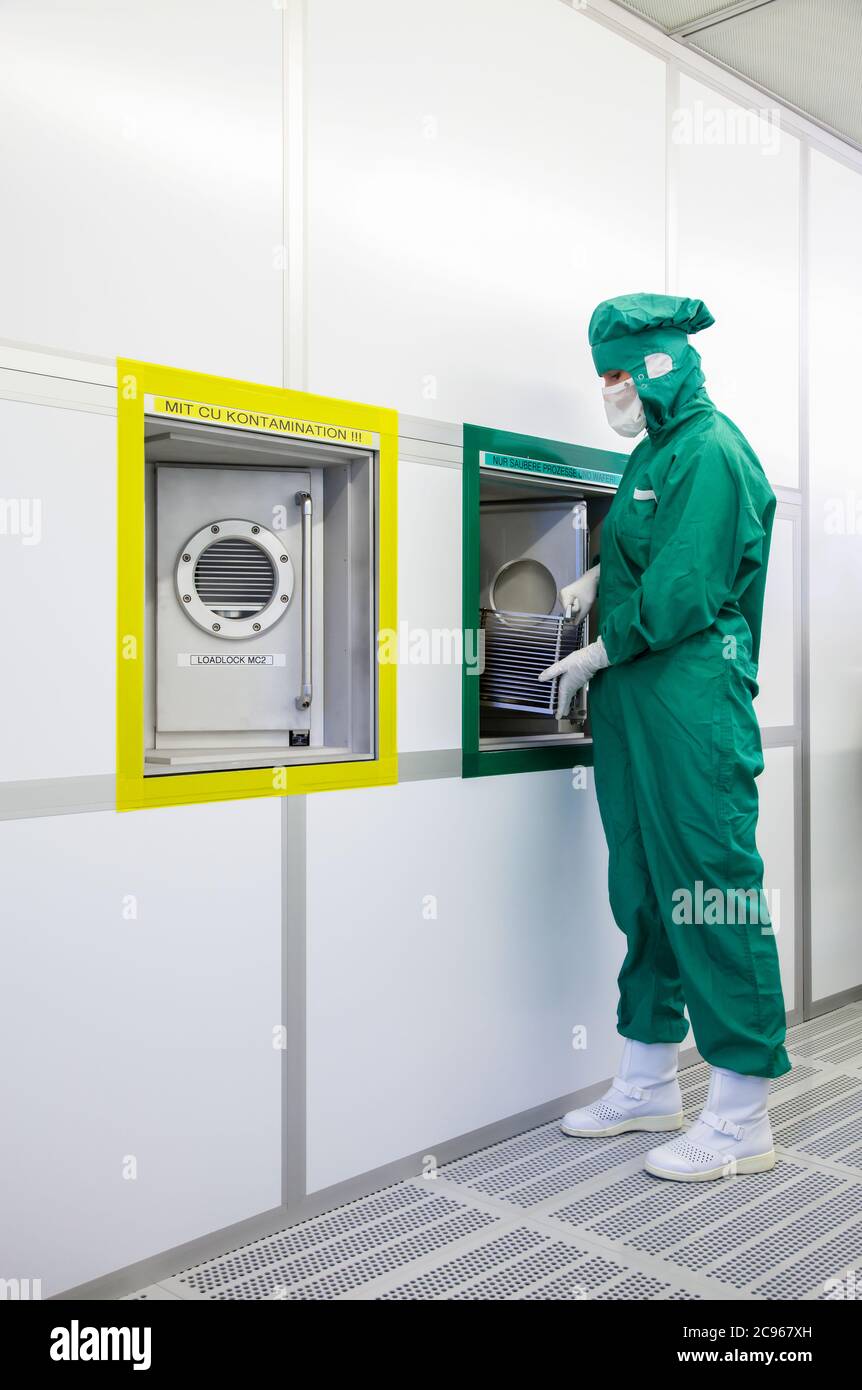 Duisburg, North Rhine-Westphalia, Germany - High Technology in the Ruhr Area. A microtechnologist works in the clean room at the Fraunhofer Institute Stock Photo