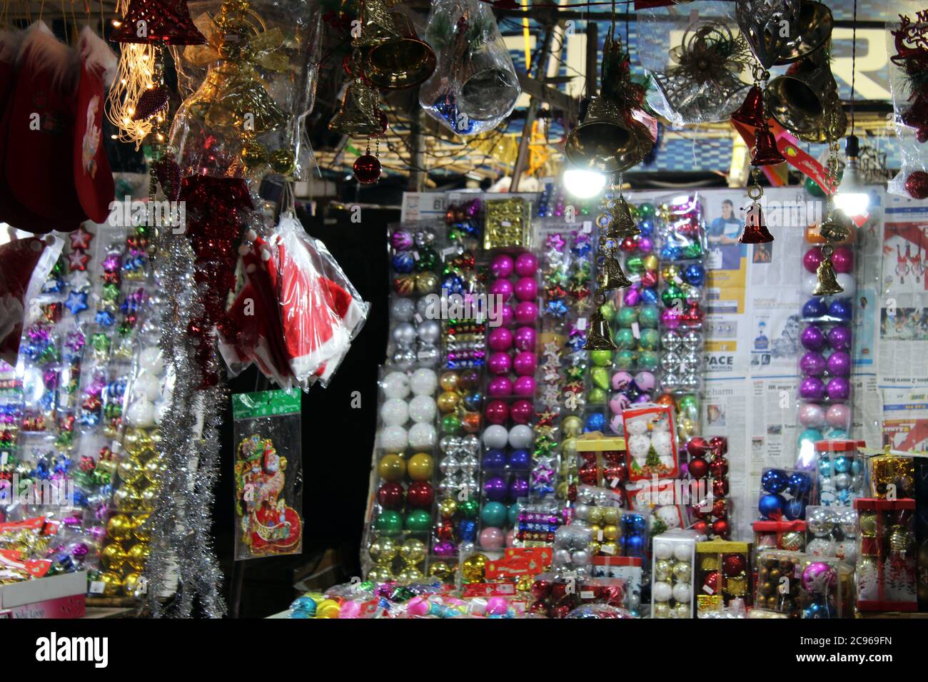 Kolkata, West Bengal/India - December 29, 2019: Various colorful Christmas decoration selling on a open shop at market before Christmas, at Esplanade, Stock Photo
