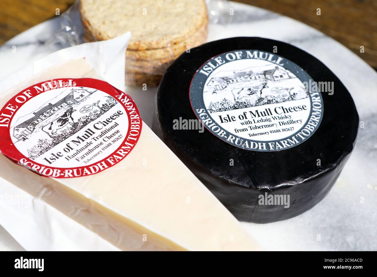 Isle of Mull cheese and oatcakes on a marble cheese board Stock Photo