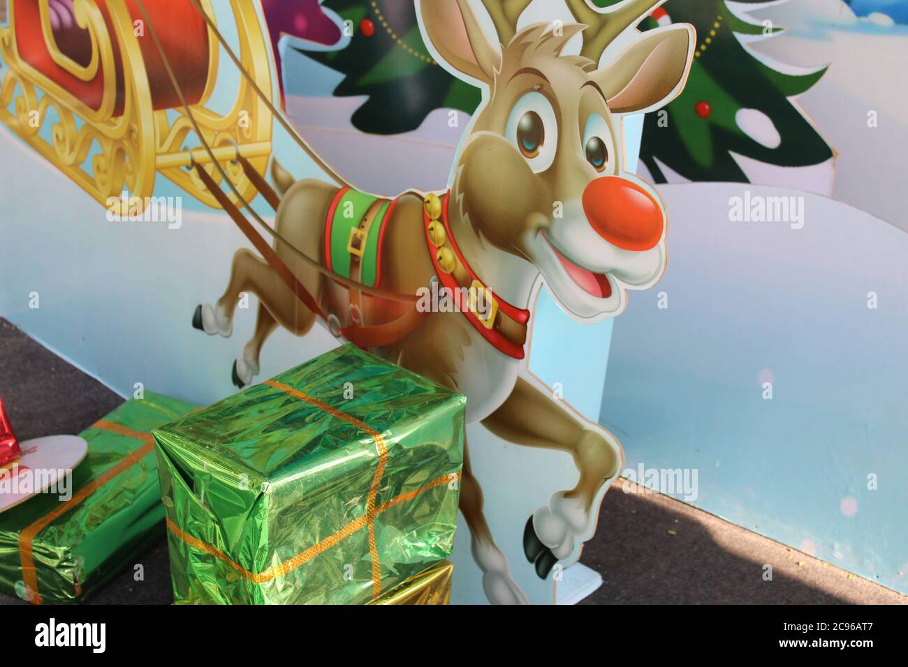 Kolkata, West Bengal/India - December 29, 2019: Cropped View of Santa Claus and Christmas tree and colorful gift boxes for Christmas decoration at Par Stock Photo