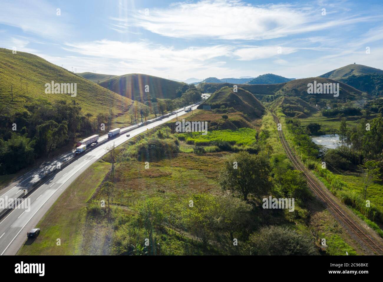 Highway train cars trucks hi-res stock photography and images - Alamy