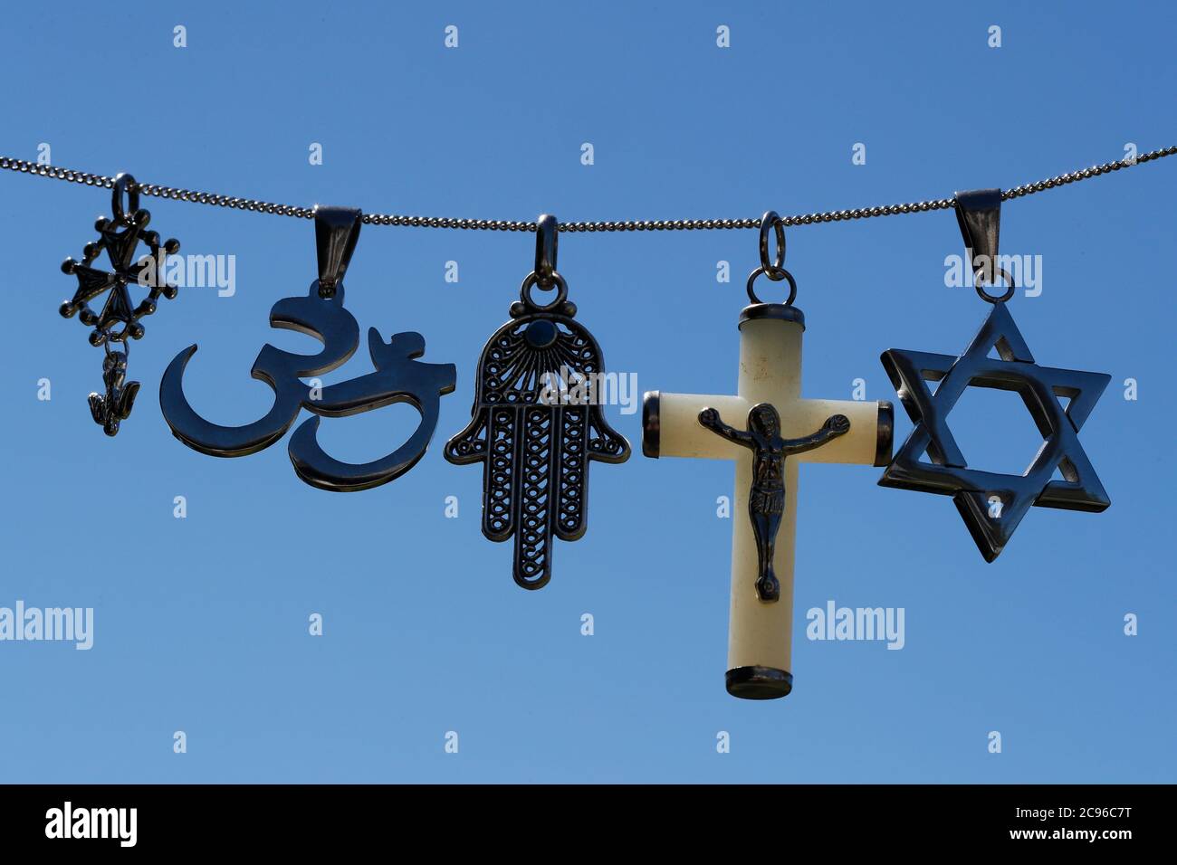 Religious symbols.  Christianity, Islam, Judaism, Buddhism and Hinduism. Interfaith dialogue.  France. Stock Photo