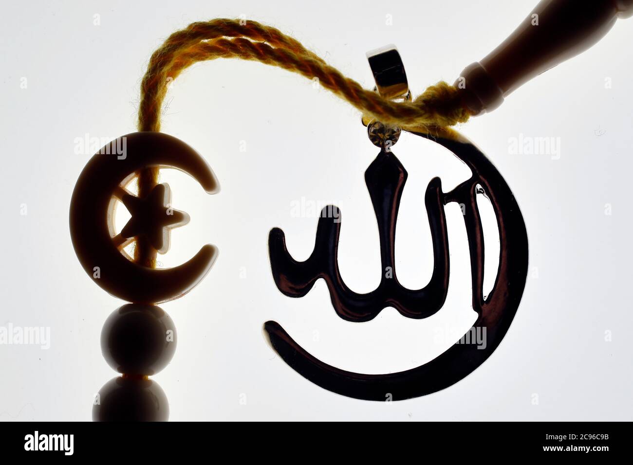 Tasbih (muslim prayer beads) and  muslim Allah pendant. France. Stock Photo