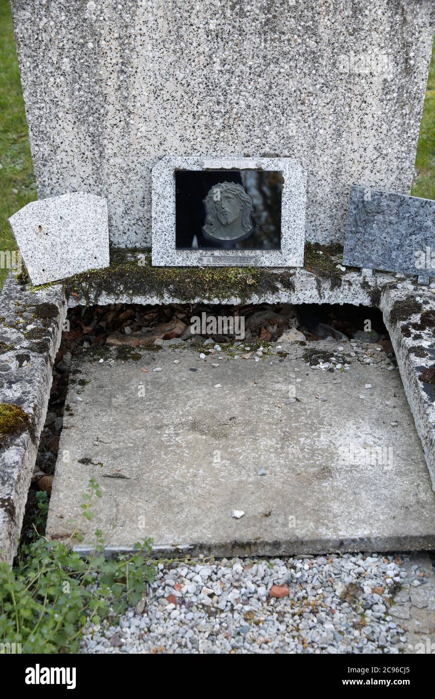 Disused grave in Saint Aubin cemetery, Eure, France. Stock Photo