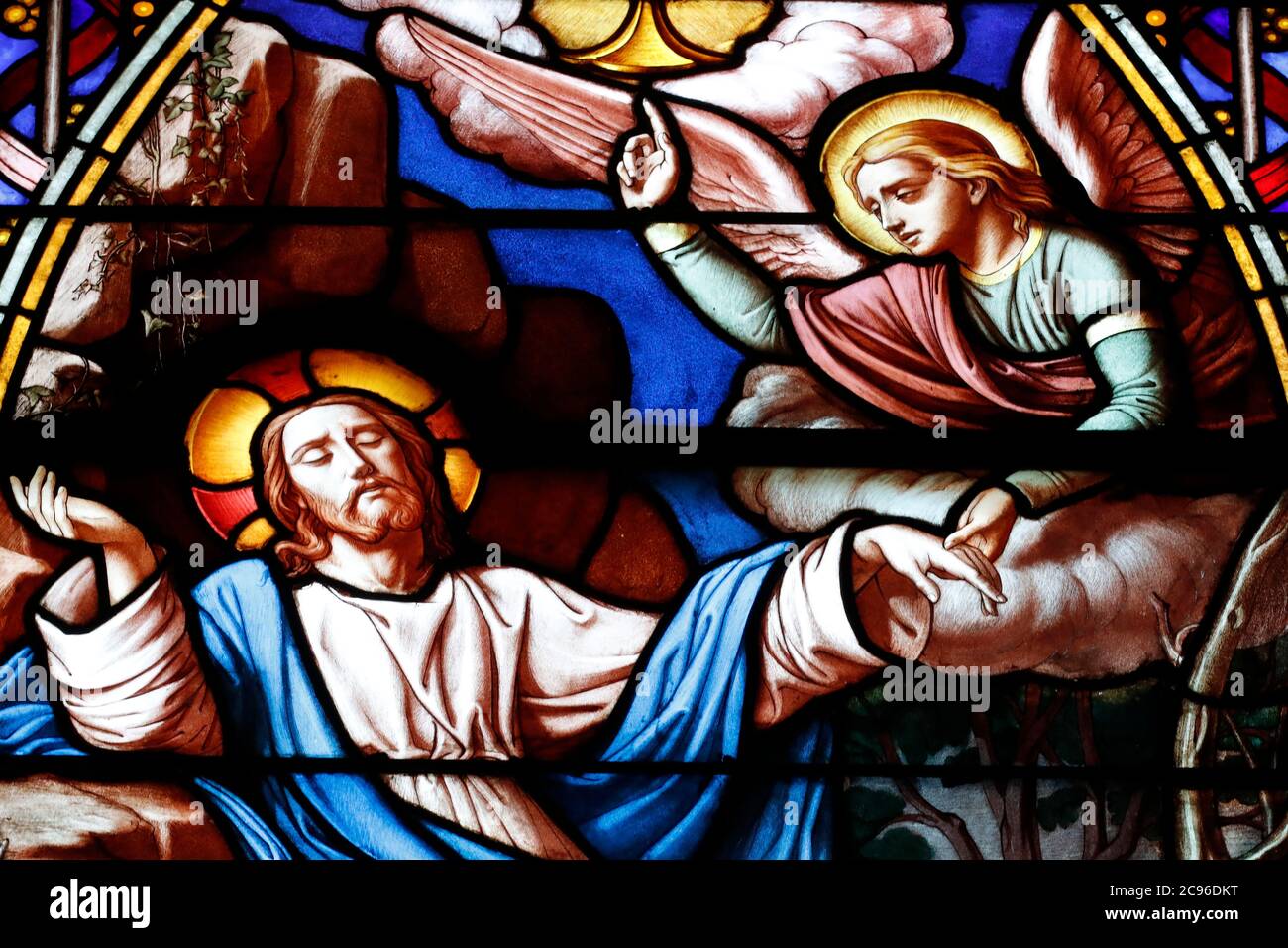 Basilica of Our Lady of Geneva.  Stained glass window.  Jesus praying in the garden of Gethsemane  after the Last Supper, while the disciples sleep. G Stock Photo