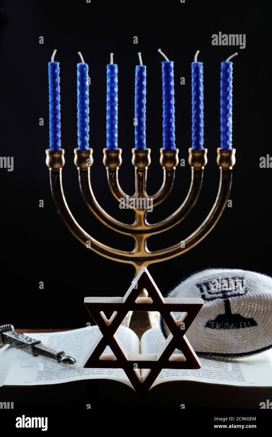 Open Torah, star of David, Kippah, Yad and the menorah or sevenlamp