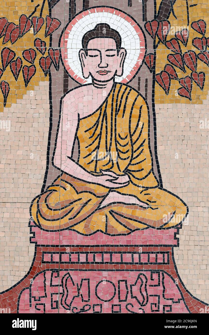 Ong Nui buddhist pagoda. Wall fresco.  The life of the Buddha.  Shakyamuni Buddha sitting in the meditation pose under the Bodhi tree.  Quy Nhon. Viet Stock Photo