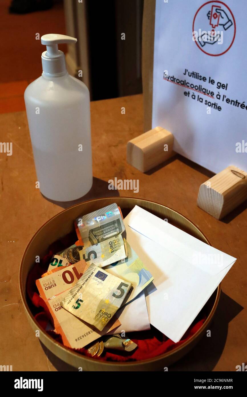 Catholic church. Basket with collection. Sallanches. France Stock Photo Alamy