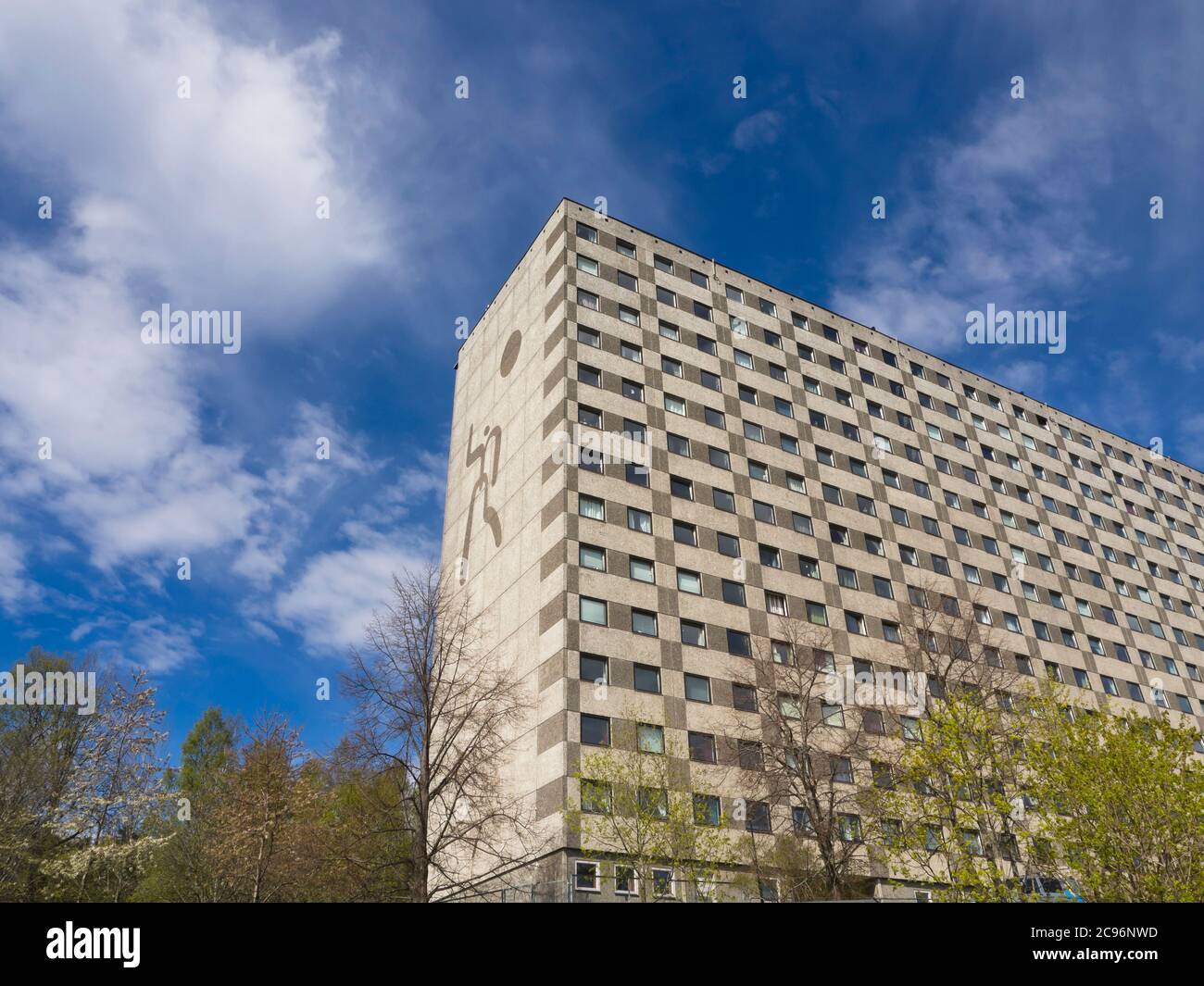 Looking up at a massive block of flats with a decorative end wall, a landmark in the suburb of Ammerud in Oslo Norway Stock Photo