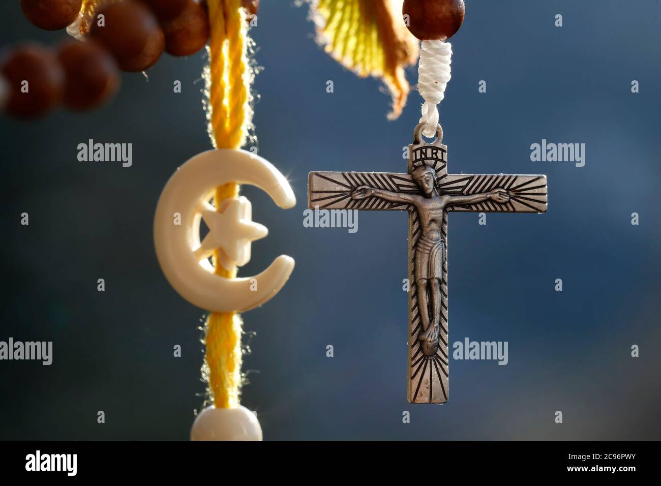 Christianity and Islam 2 monotheistic religions. Christian cross and islamic cross and crescent :  Interreligious symbols. France. Stock Photo