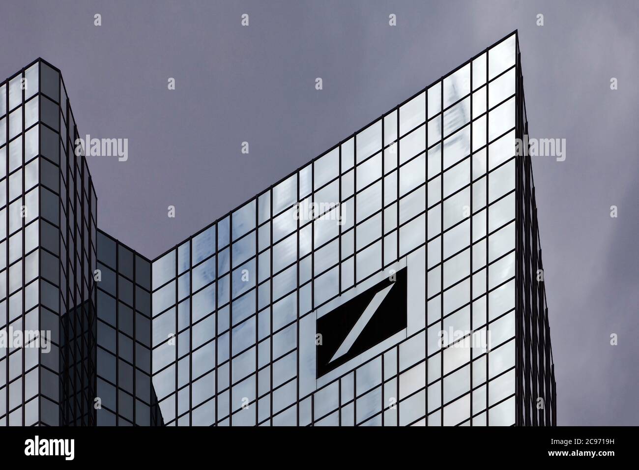 dark clouds over the Deutsche Bank Group Headquarters, Germany, Hesse, Frankfurt am Main Stock Photo
