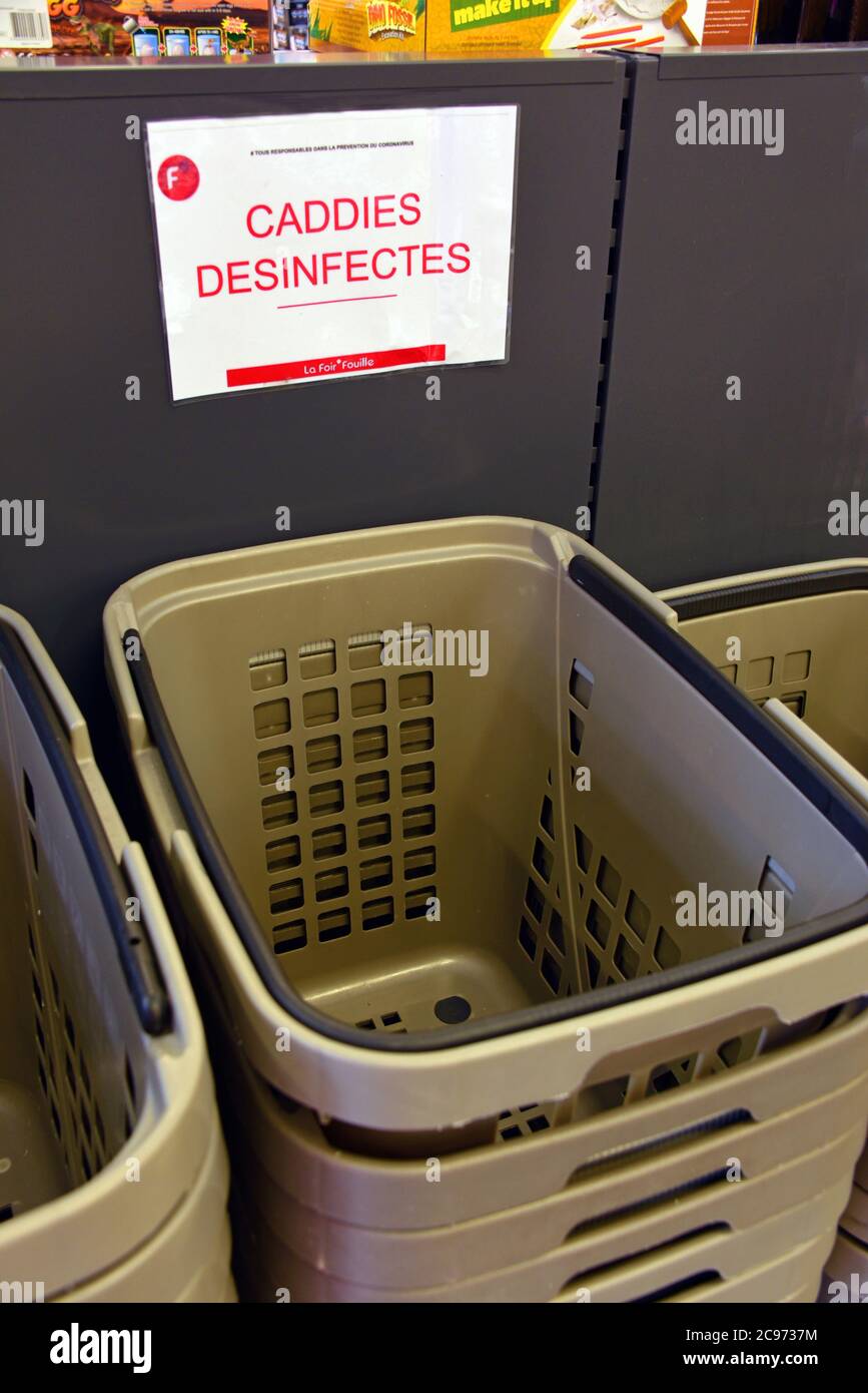 covid 19, disinfectant caddies in a supermarket, France, Savoie Stock Photo