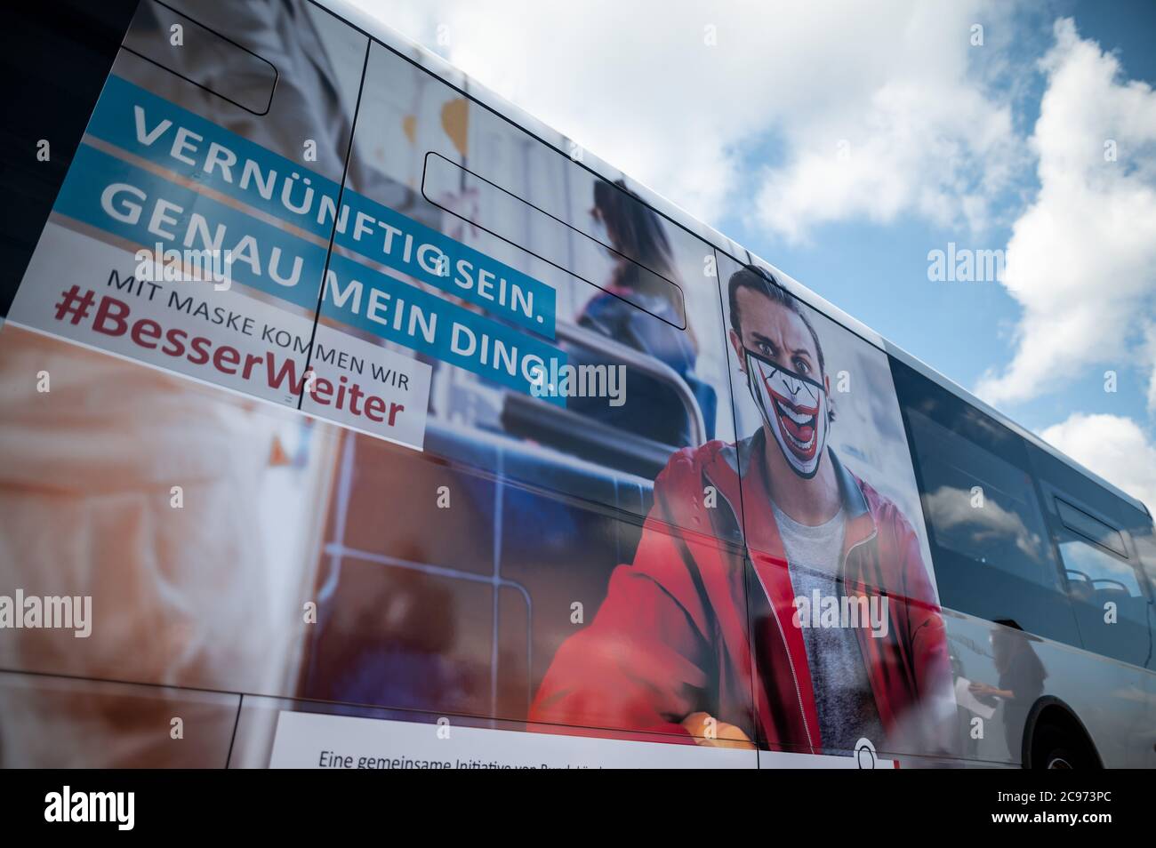 Duesseldorf, Germany. 29th July, 2020. The poster for the new campaign can  be seen on the side of a Rheinbahn bus. With the campaign, the federal  government, the federal states, municipal umbrella