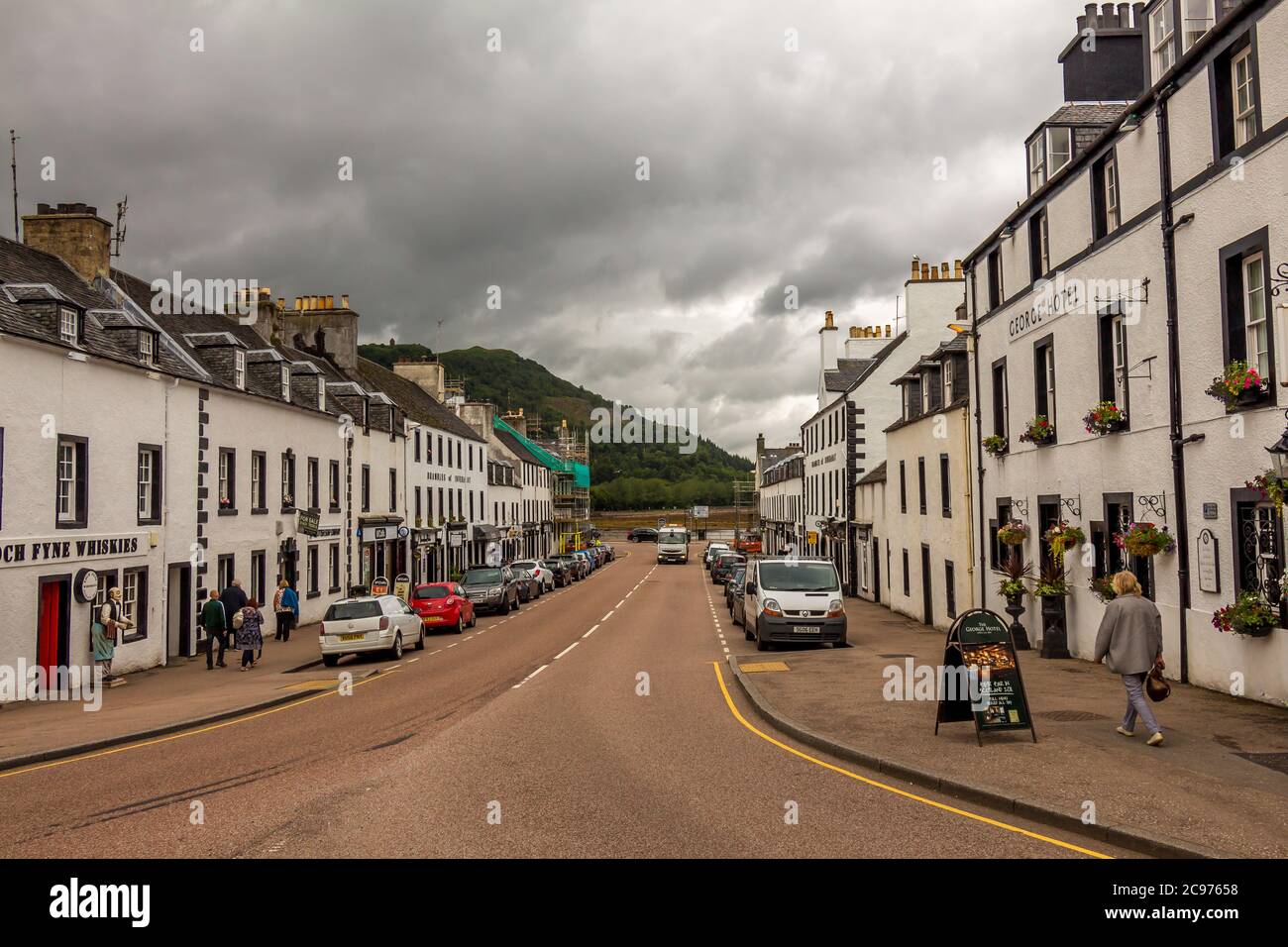 Inveraray, Scotland - July 14th 2016: The Main Street of the West Coast of Scotland town of Inverarary on cloudy summers day in Argyll, Scotland Stock Photo