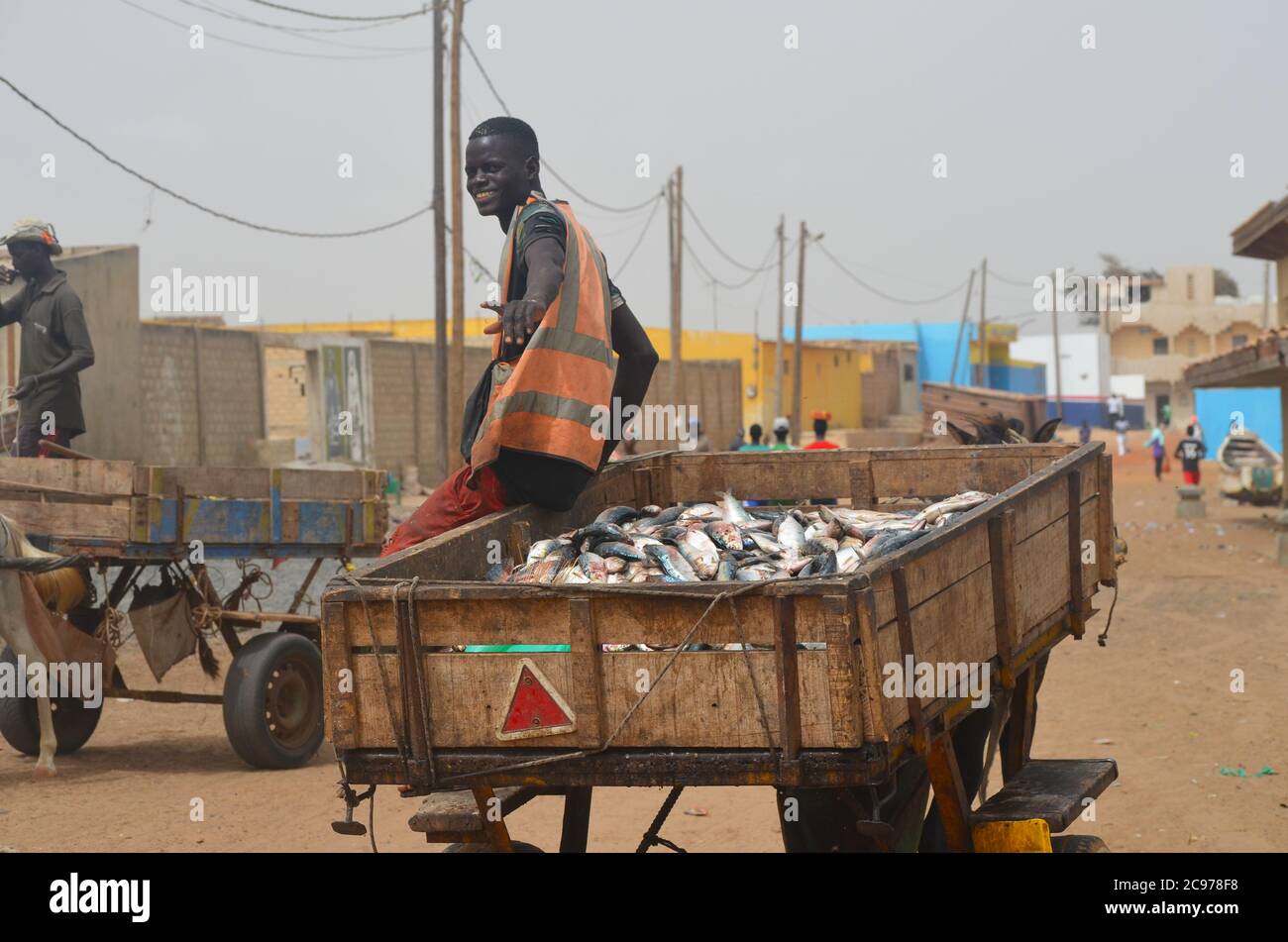 Artisanal fish processing site in Cayar, Senegal Stock Photo