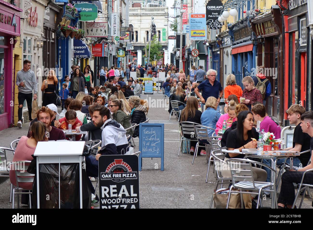 People enjoying dining out in restaurants on Princes street, Cork city,  Co Cork,Ireland Stock Photo