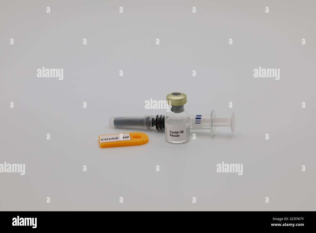 Covid-19 vaccin in flacon and accmpanied with syringe Stock Photo