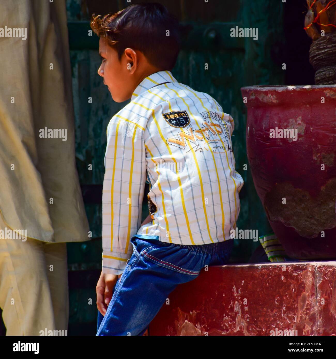 New Delhi India – March 13 2020 : Child Inside Hazrat Nizamuddin Dargah during the day time in Delhi India, Religious Darah of Nizamuddin in Delhi dur Stock Photo