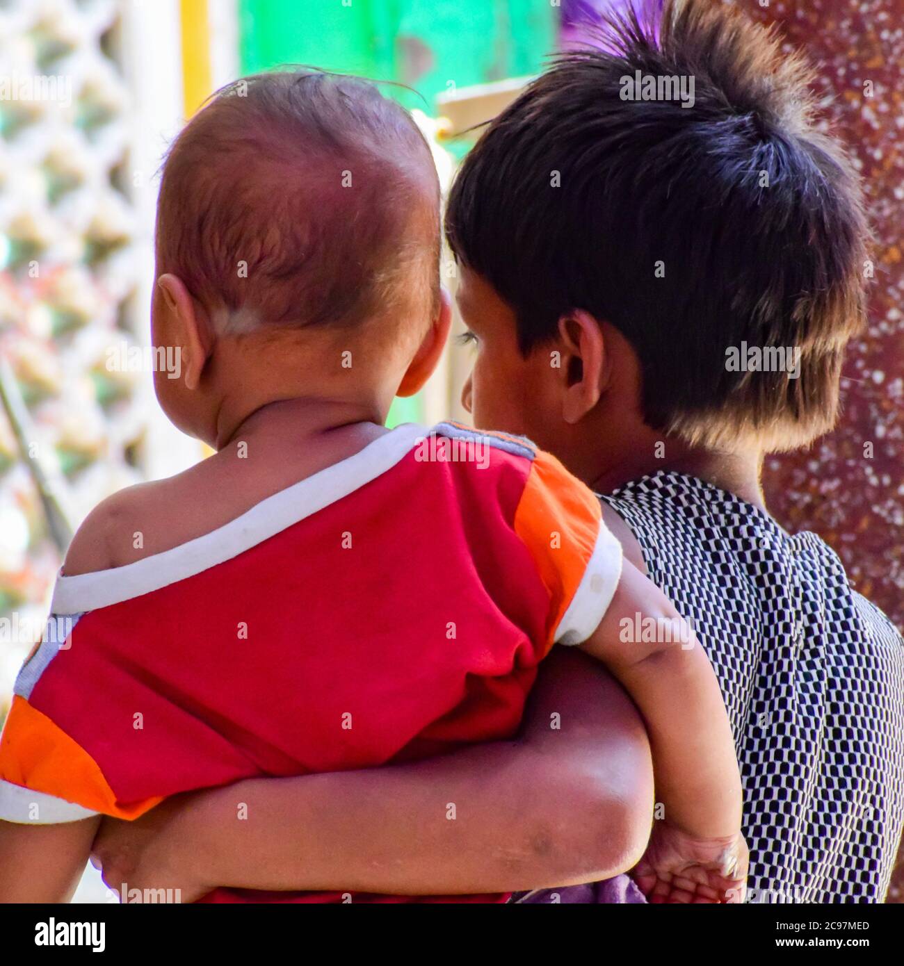 New Delhi India – March 13 2020 : Child Inside Hazrat Nizamuddin Dargah during the day time in Delhi India, Religious Darah of Nizamuddin in Delhi dur Stock Photo